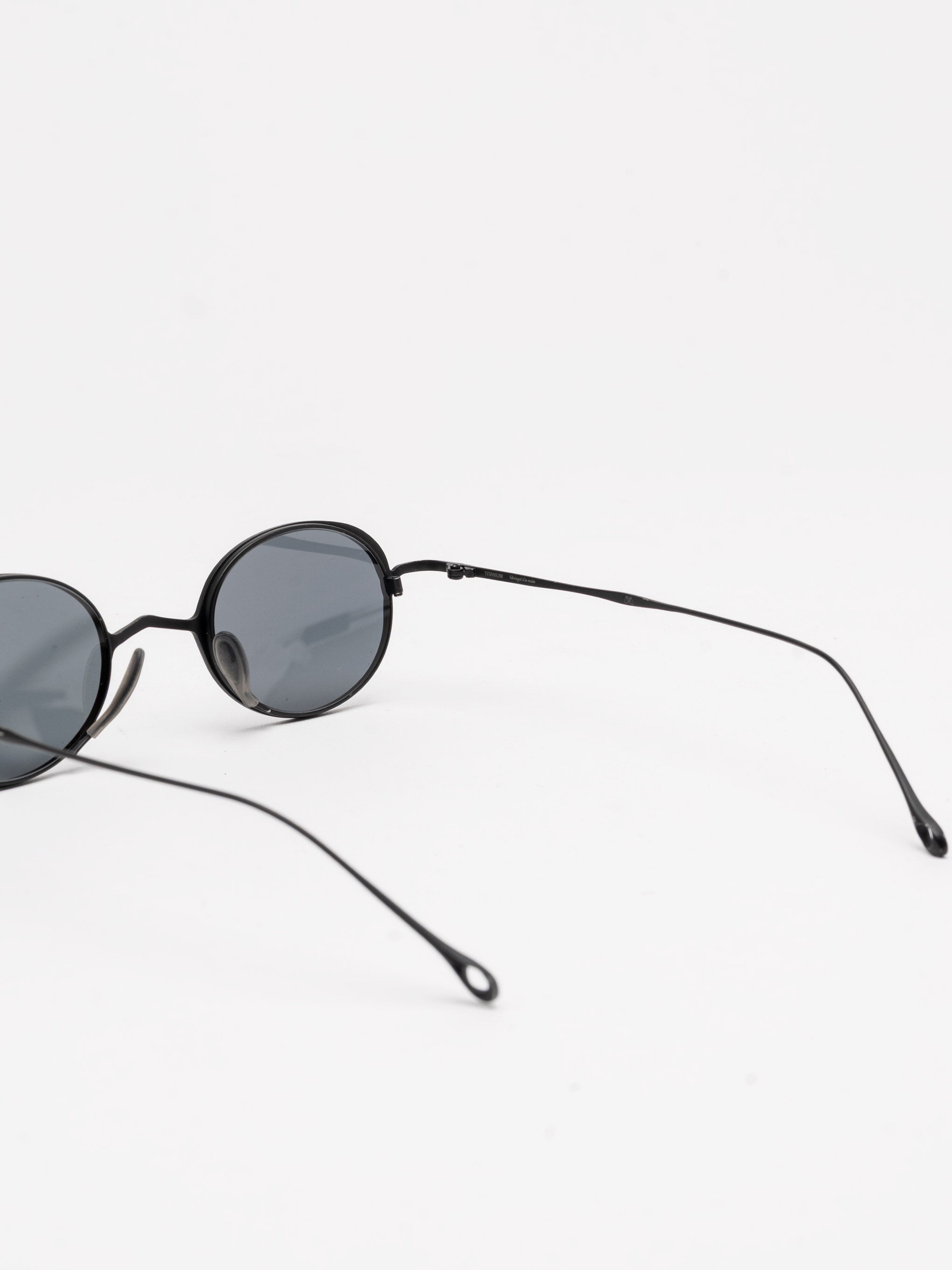 Oval Titanium Sunglasses
