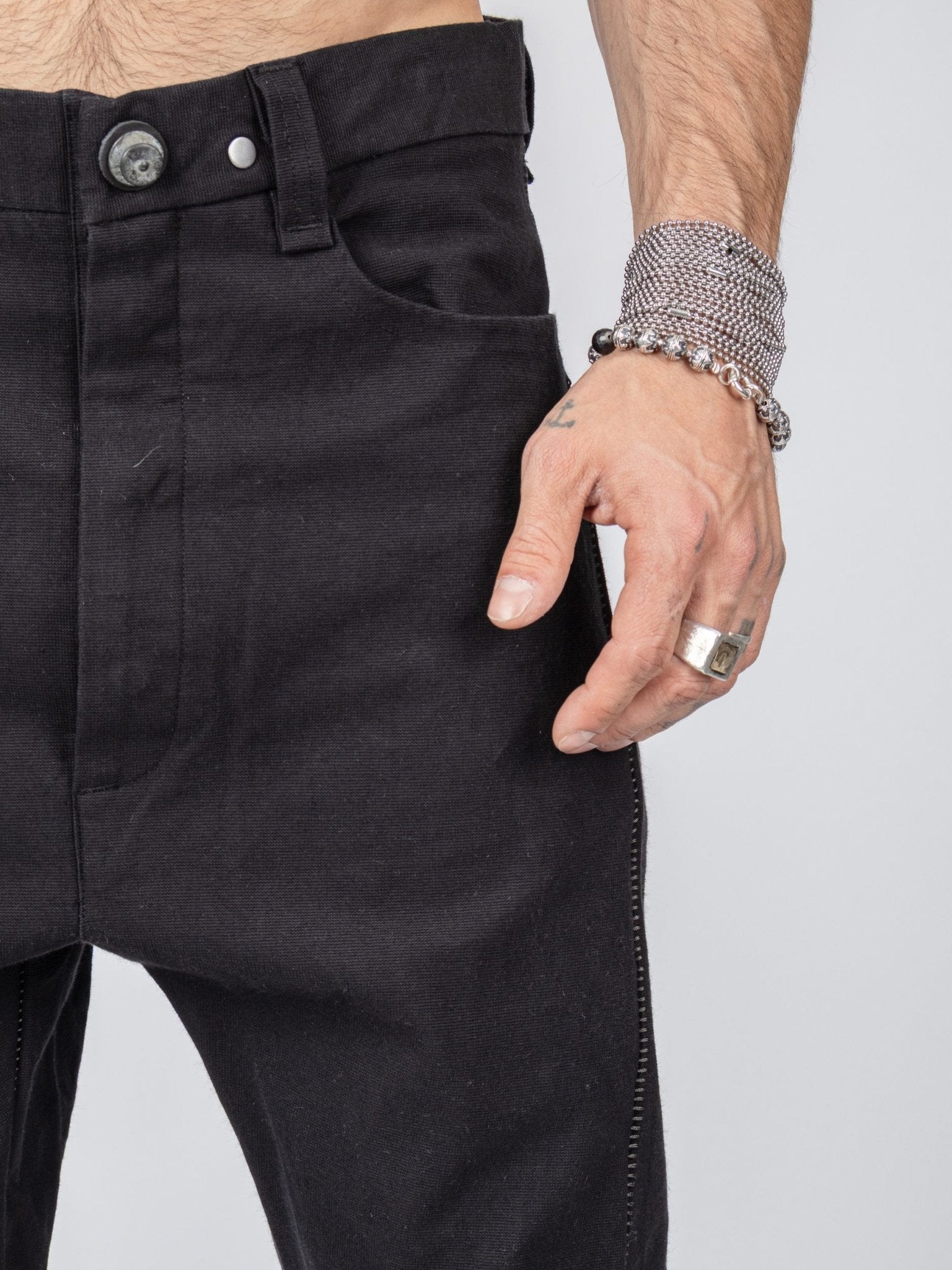 LC4 armure cotton pants flat lay - showing armure weave texture and fabric hand