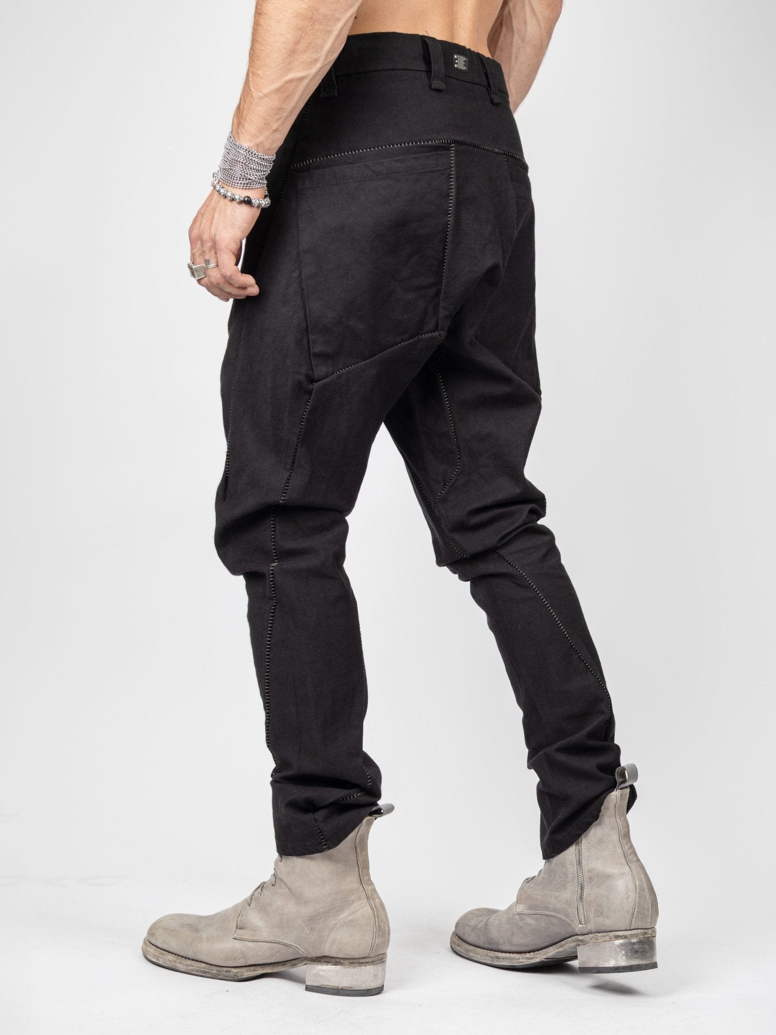Isaac Sellam LC4 pants back view - steel staple signature and armure weave texture