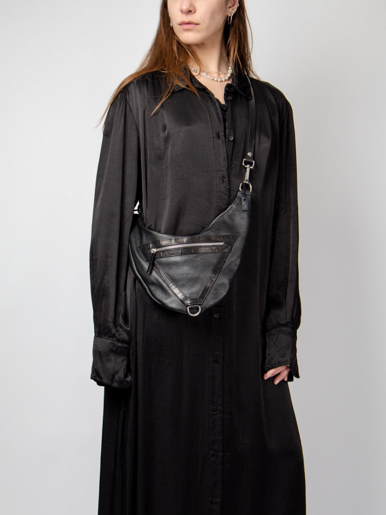 NOAM Triangle Crossbody, front crossbody bag styling view