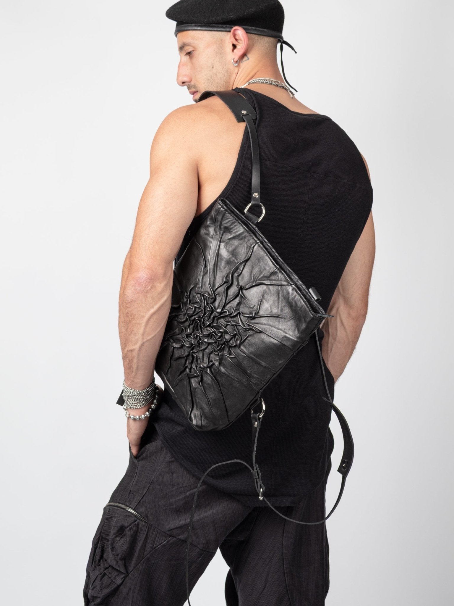 NOAM Textured Backpack, backpack worn crossbody view