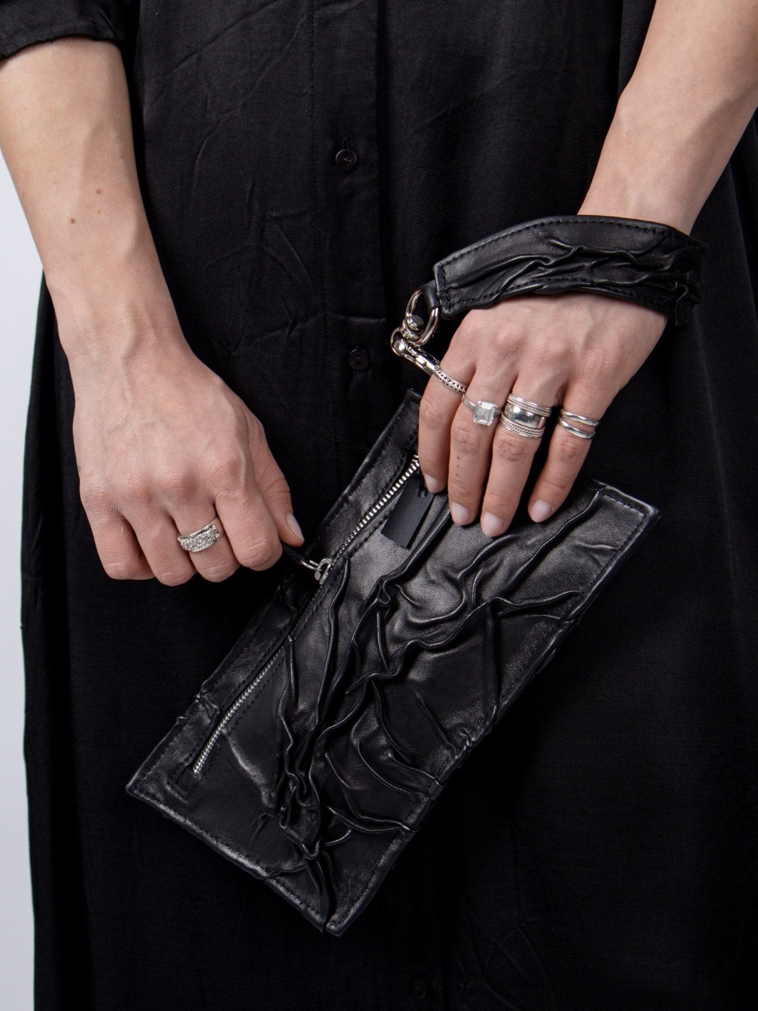 NOAM Textured Clutch, handheld clutch detail view