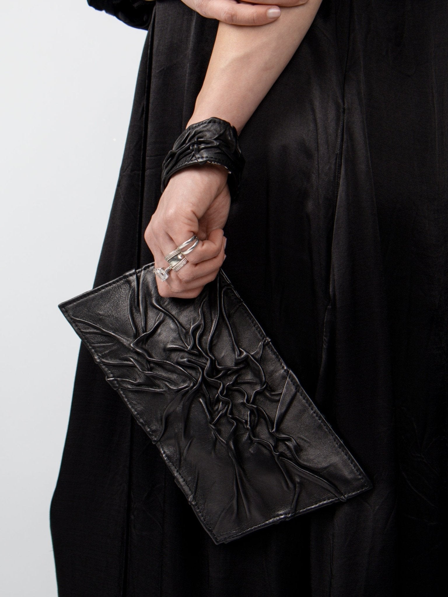 NOAM Textured Clutch, handheld clutch styling view