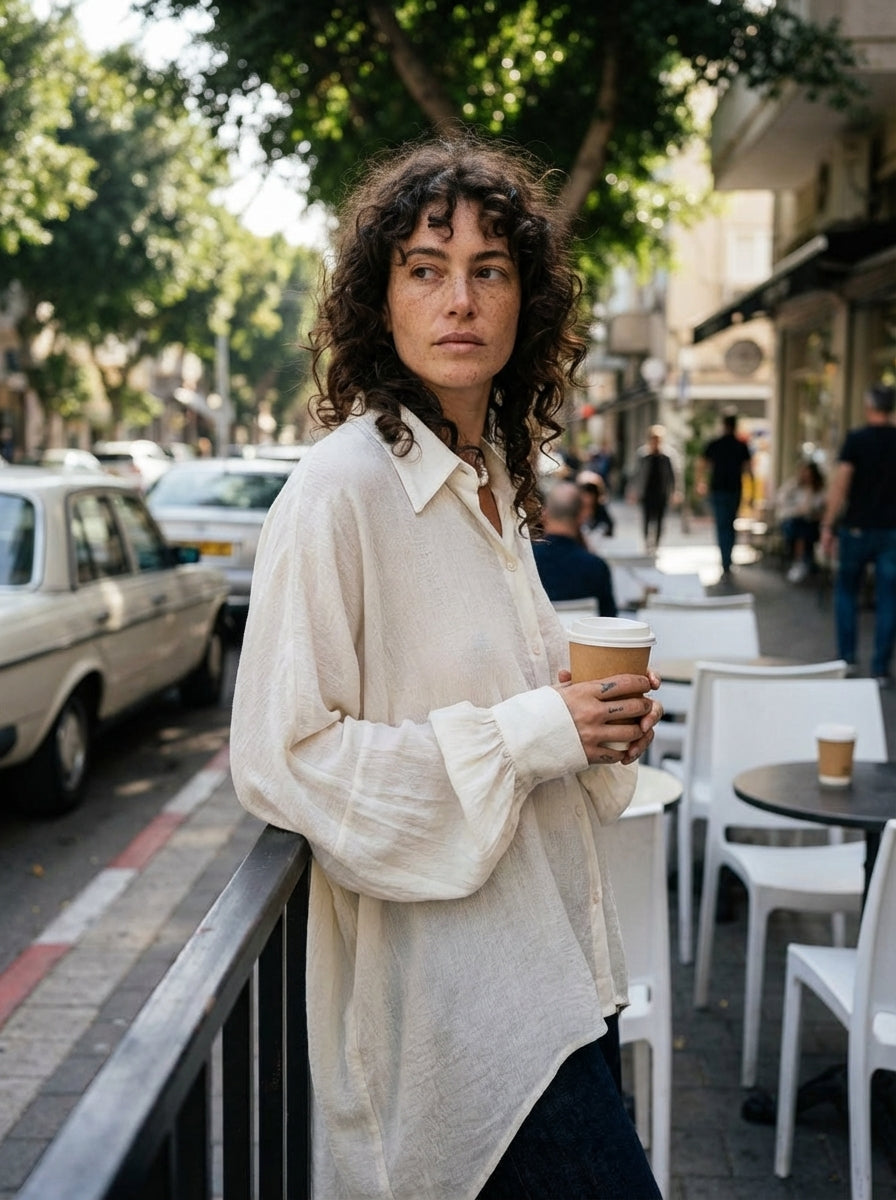 NOSTRA SANTISSIMA - Oversized Textured Shirt - Day - Leaning (Cafe Scene) - Tel Aviv Street Style