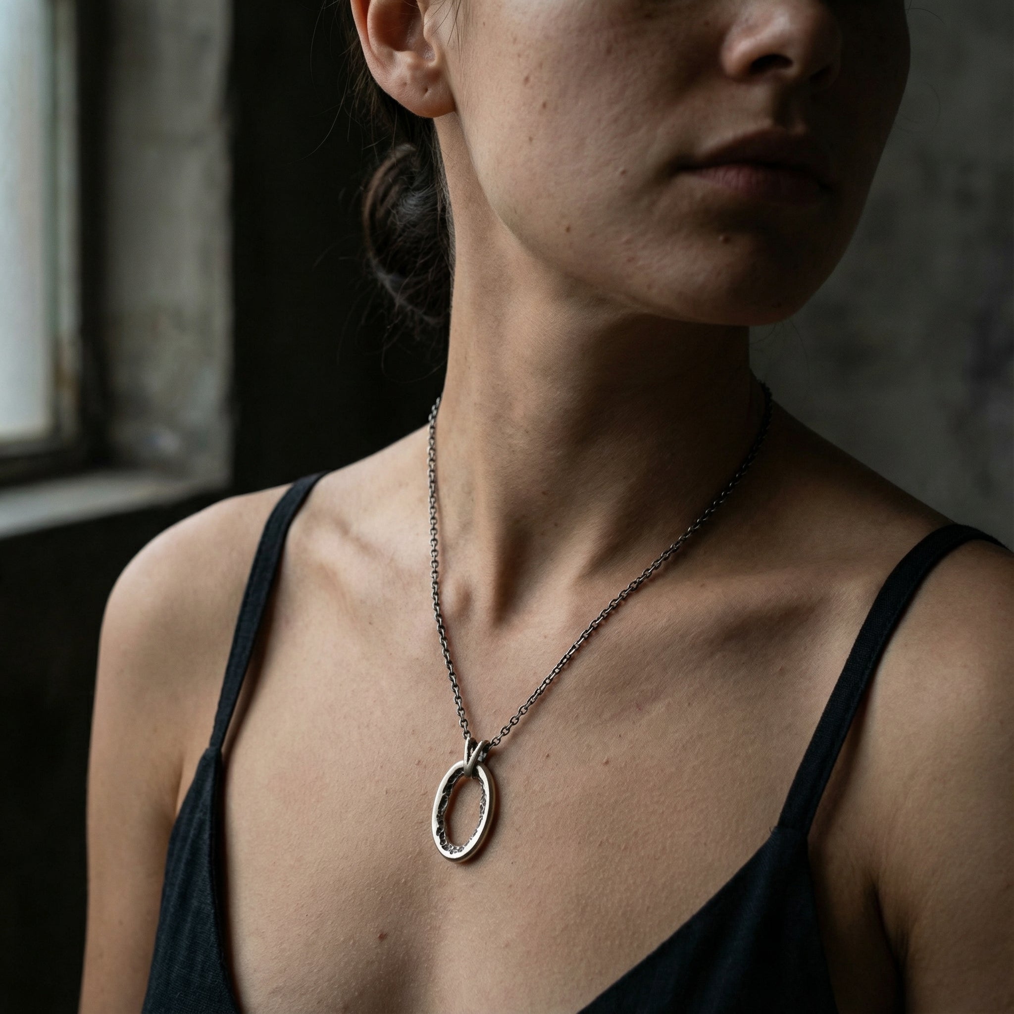 AITO - Pendant Necklace with Raw Oval Element - Female Décolletage