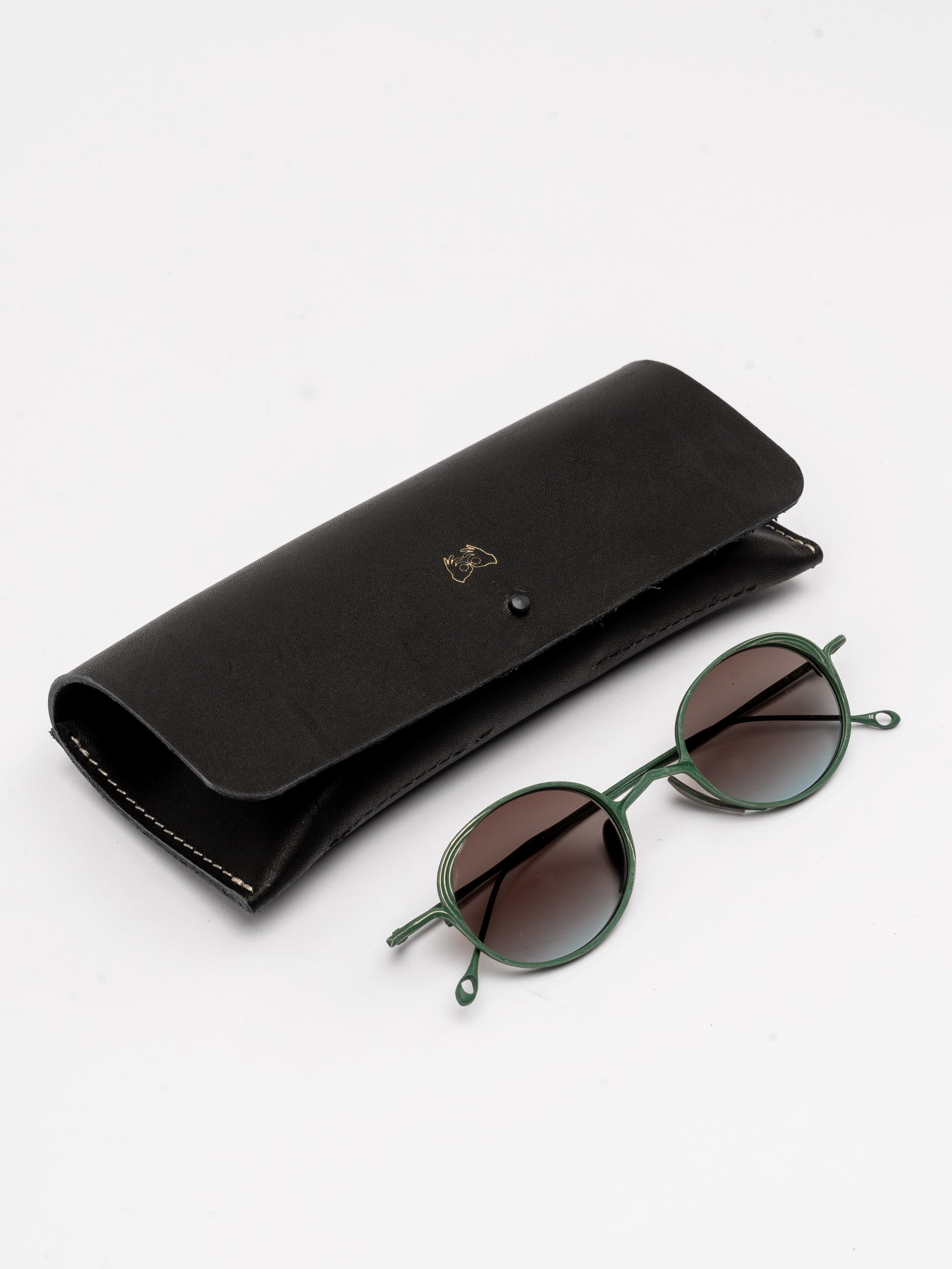 Oval Titanium Sunglasses