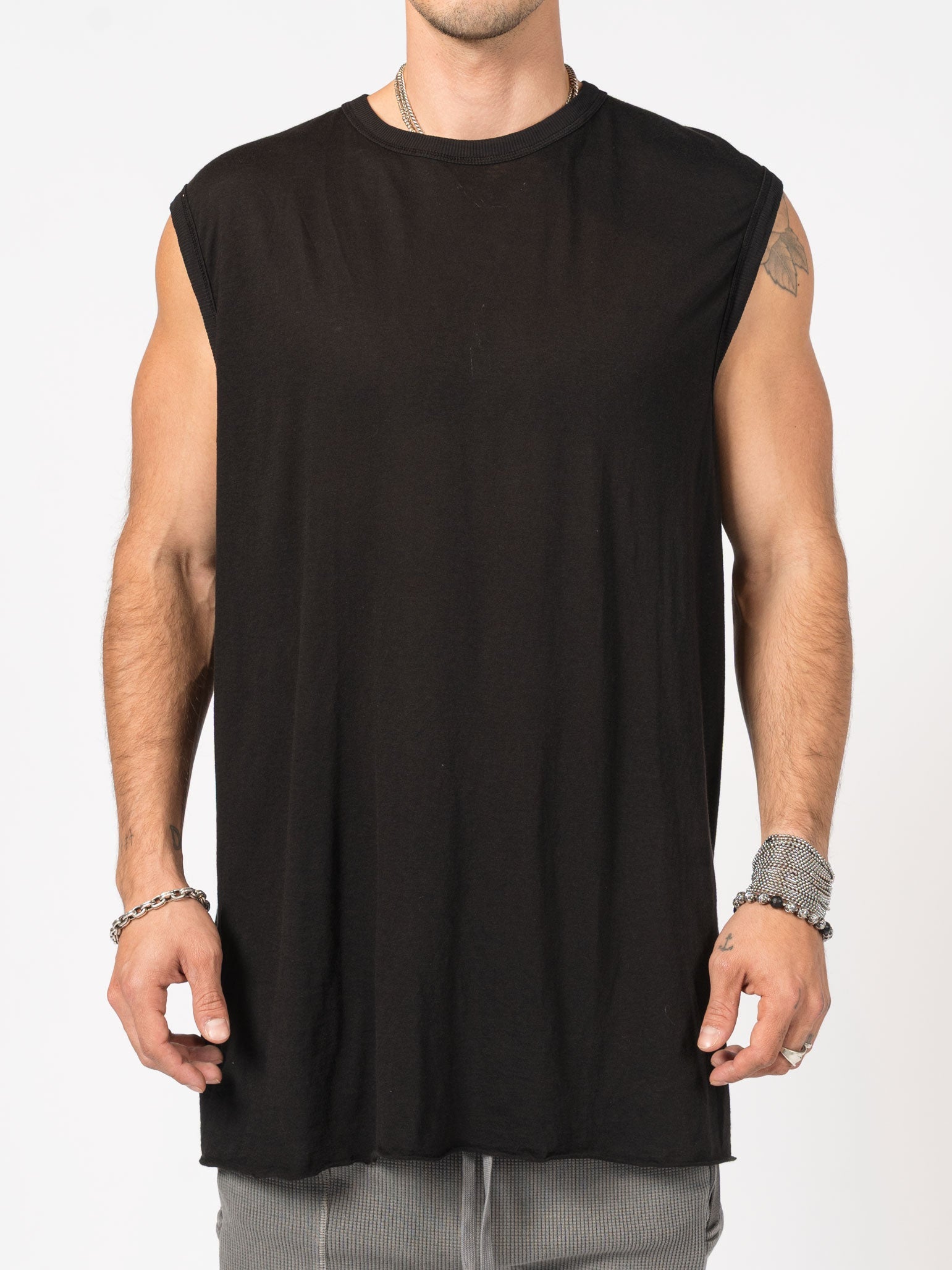Sleeveless Top with Raw Edges