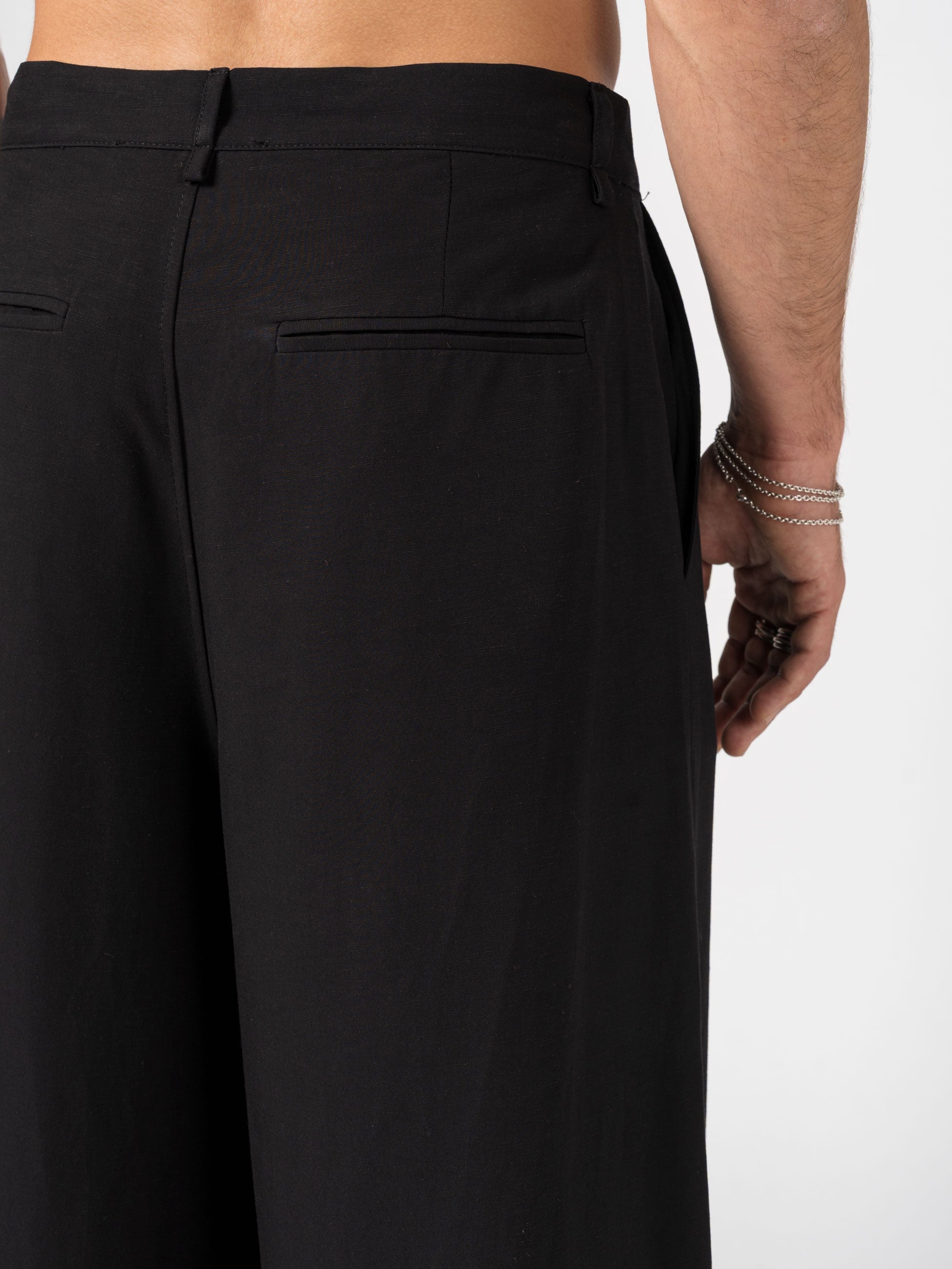 Wide-Leg Pleated Trousers