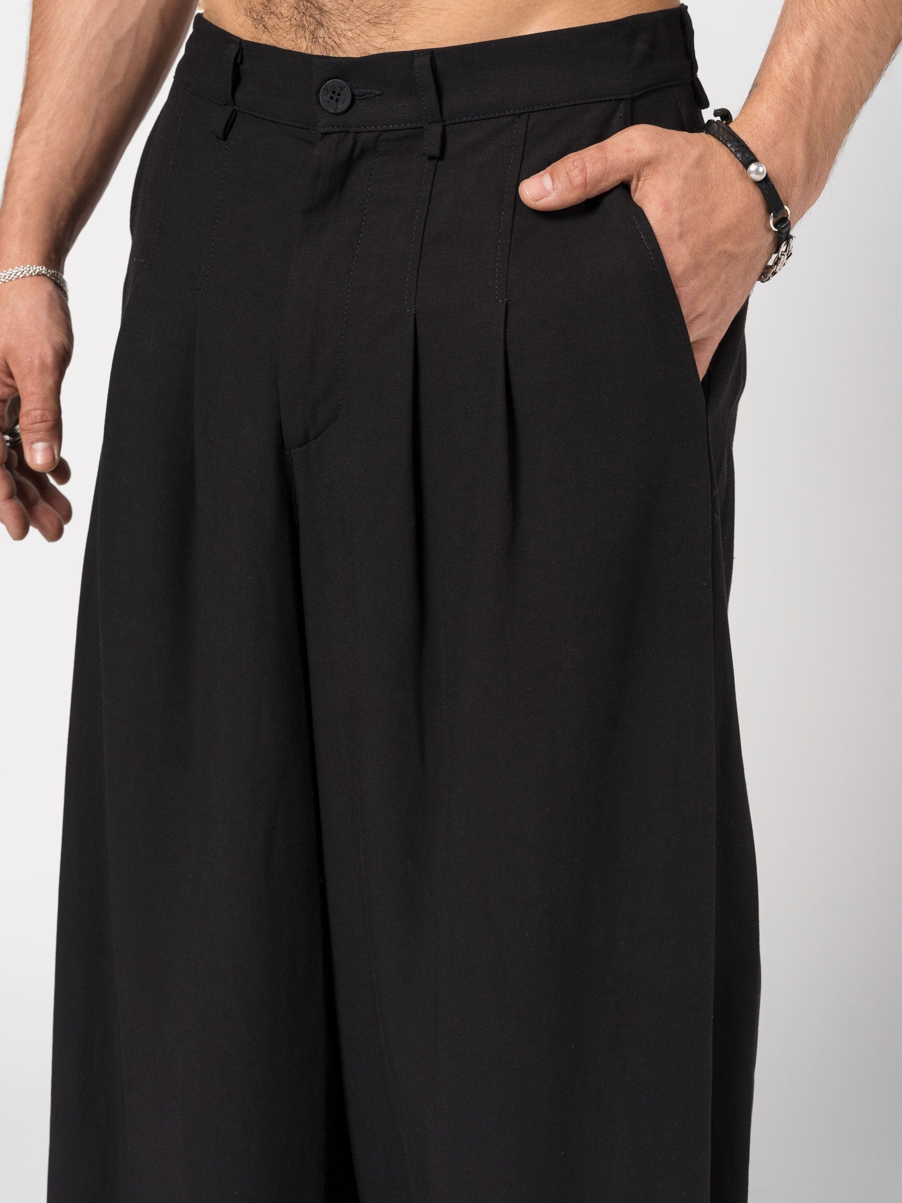 Wide-Leg Pleated Trousers